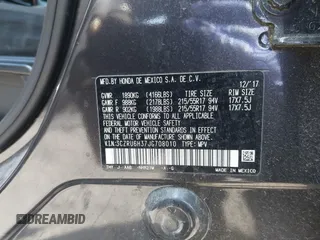 2018 Honda HR-V LX with VIN 3CZRU6H37JG708010, listed as a IAAI auction lot 42059990 with 100,822 mi miles. Bid and sale history available at carsss.com. Image 9.