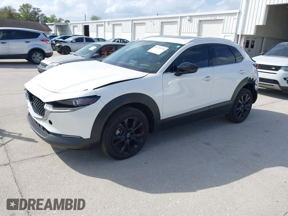 2022 Mazda CX-30 2.5 Turbo Premium Package with VIN 3MVDMBDY3NM437897, listed as a IAAI auction lot 41715776 with 42,771 mi miles. Bid and sale history available at carsss.com. Image 17.