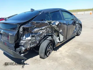 2016 Toyota Prius Two z VIN JTDKBRFU1G3521884, wystawiony jako IAAI lot #42081852 z przebiegiem 93 107 mil mil oraz . Historia ofert i sprzedaży dostępna na DreamBid. Obrazek 6.