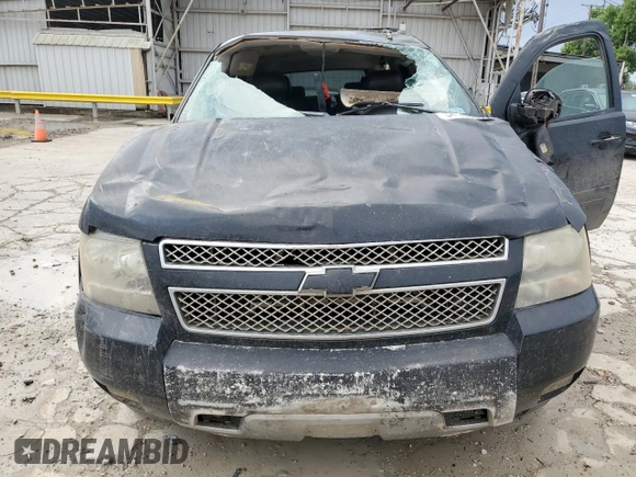 2011 Chevrolet Suburban LT with VIN 1GNSKJE38BR240348, listed as a Copart auction lot 54163335 with 263,030 mi miles and Salvage Title. Bid and sale history available at carsss.com. Image 11.