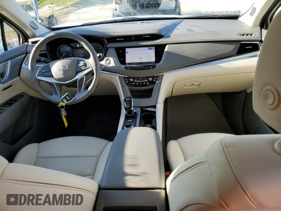 2023 Cadillac XT5 FWD Premium Luxury with VIN 1GYKNCR44PZ159038, listed as a Copart auction lot 50614465 with 11,781 mi miles and Salvage Title. Bid and sale history available at carsss.com. Image 8.