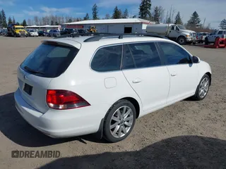 2012 Volkswagen Jetta SportWagen TDI with VIN 3VWPL7AJ8CM652661, listed as a IAAI auction lot 41670941 with 193,334 mi miles. Bid and sale history available at carsss.com. Image 4.
