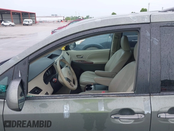 2011 Toyota Sienna XLE AAS with VIN 5TDYK3DC7BS041020, listed as a IAAI auction lot 42218328 with Not Provided miles and . Bid and sale history available at DreamBid. Image 6.