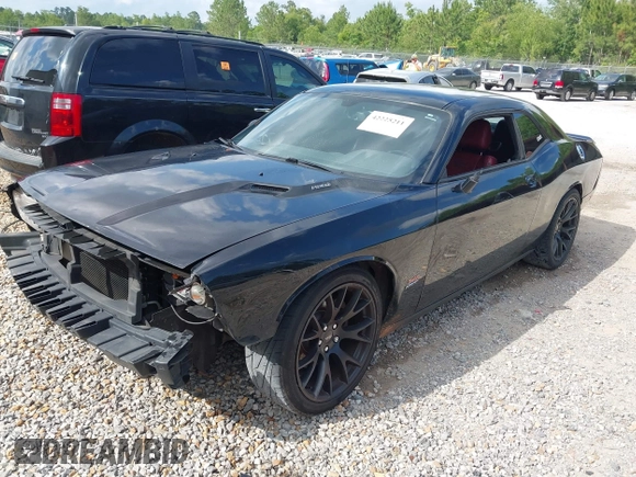 2014 Dodge Challenger R/T Plus z VIN 2C3CDYBT1EH201887, wystawiony jako IAAI lot #42225211 z przebiegiem 278 574 mil mil oraz . Historia ofert i sprzedaży dostępna na DreamBid. Obrazek 2.
