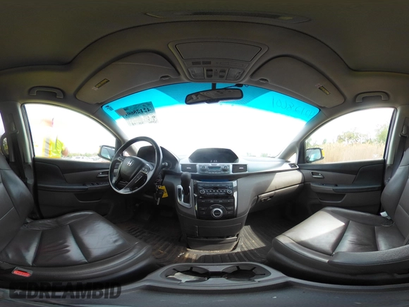 2012 Honda Odyssey Touring with VIN 5FNRL5H92CB055473, listed as a IAAI auction lot 42128601 with 163,901 mi miles. Bid and sale history available at carsss.com. Image 20.