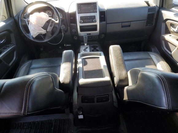 2015 Nissan Titan SL with VIN 1N6BA0ECXFN503956, listed as a Copart auction lot 80520844 with 107,989 mi miles and Salvage Title. Bid and sale history available at carsss.com. Image 8.