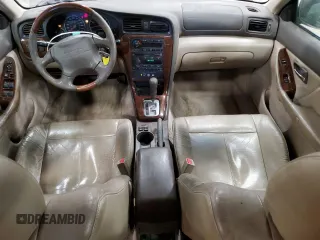 2004 Subaru Legacy Outback L.L. Bean with VIN 4S3BH806547632901, listed as a Copart auction lot 49159695 with 281,045 mi miles and Salvage title. Bid and sale history available at DreamBid. Image 8.