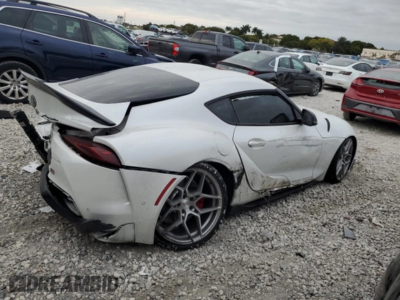 2021 Toyota GR Supra 3.0 with VIN WZ1DB0C02MW036476, listed as a Copart auction lot 88596345 with 47,682 mi miles and Salvage Title. Bid and sale history available at carsss.com. Image 3.