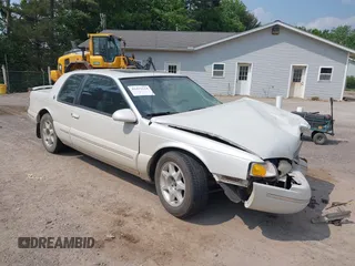 1997 Mercury Cougar z VIN 1MELM62W9VH616776, wystawiony jako IAAI lot #42411124 z przebiegiem 233 199 mil mil oraz . Historia ofert i sprzedaży dostępna na DreamBid. Obrazek 1.