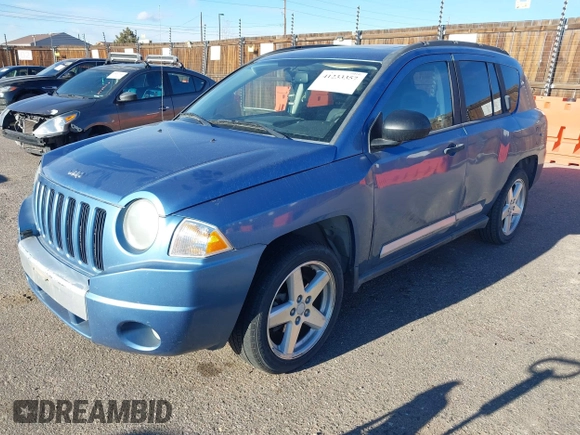 2007 Jeep Compass Limited with VIN 1J8FF57W87D409777, listed as a IAAI auction lot 41233357 with 125,019 mi miles. Bid and sale history available at carsss.com. Image 2.