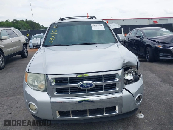 2010 Ford Escape Limited z VIN 1FMCU0E72AKD30702, wystawiony jako IAAI lot #42093802 z przebiegiem 155 572 mil mil oraz . Historia ofert i sprzedaży dostępna na DreamBid. Obrazek 12.