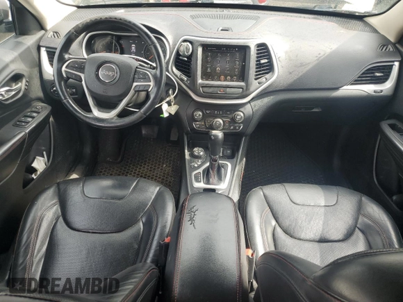 2015 Jeep Cherokee Trailhawk with VIN 1C4PJMBS0FW655167, listed as a Copart auction lot 64597165 with 193,779 mi miles and Clean title. Bid and sale history available at DreamBid. Image 8.