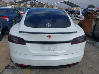 2016 Tesla Model S 90D with VIN 5YJSA1E27GF153525, listed as a IAAI auction lot 41539221 with 145,771 mi miles and . Bid and sale history available at DreamBid. Image 16.