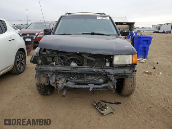 1999 Isuzu Rodeo S with VIN 4S2CM58W4X4339262, listed as a Copart auction lot 82804154 with 177,097 mi miles and Salvage Title. Bid and sale history available at carsss.com. Image 5.