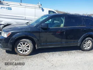 2017 Dodge Journey SXT with VIN 3C4PDCBG5HT604947, listed as a IAAI auction lot 41851008 with 208,674 mi miles and . Bid and sale history available at carsss.com. Image 14.