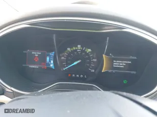 2014 Ford Fusion SE Hybrid with VIN 3FA6P0LU0ER385982, listed as a IAAI auction lot 41804715 with 110,590 mi miles. Bid and sale history available at carsss.com. Image 7.