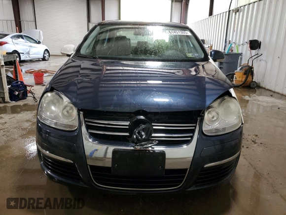 2009 Volkswagen Jetta SE z VIN 3VWRZ71K29M167800, wystawiony jako Copart lot #61451305 z przebiegiem 161 617 mil mil oraz Szkoda całkowita • Salvage title. Historia ofert i sprzedaży dostępna na DreamBid. Obrazek 5.