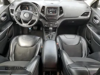 2020 Jeep Cherokee Latitude Plus with VIN 1C4PJLLB0LD653676, listed as a Copart auction lot 55921075 with 98,997 mi miles and Salvage title. Bid and sale history available at DreamBid. Image 8.