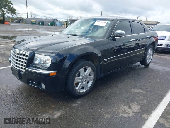 2006 Chrysler 300 C with VIN 2C3LK63H66H142437, listed as a IAAI auction lot 41751890 with 57,374 mi miles. Bid and sale history available at carsss.com. Image 17.