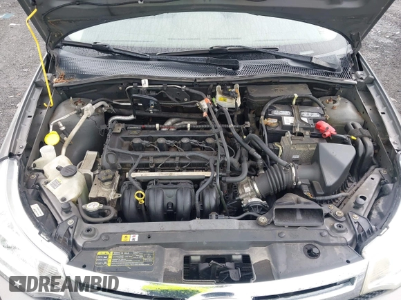 2009 Ford Focus SE z VIN 1FAHP35N59W180533, wystawiony jako IAAI lot #42443367 z przebiegiem 176 065 mil mil oraz . Historia ofert i sprzedaży dostępna na DreamBid. Obrazek 10.