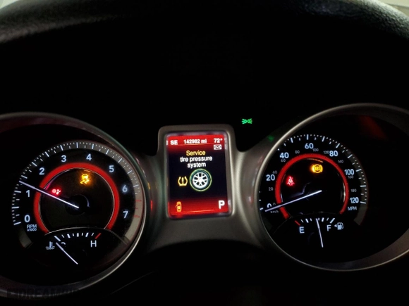 2014 Dodge Journey Limited with VIN 3C4PDCDG6ET122674, listed as a Copart auction lot 77405784 with 142,982 mi miles and Salvage Title. Bid and sale history available at carsss.com. Image 9.