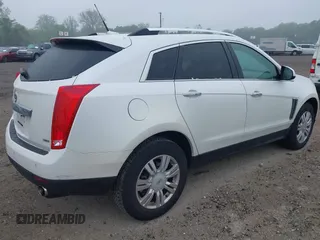 2013 Cadillac SRX Luxury Collection with VIN 3GYFNCE35DS542574, listed as a IAAI auction lot 42197843 with 137,319 mi miles. Bid and sale history available at carsss.com. Image 4.