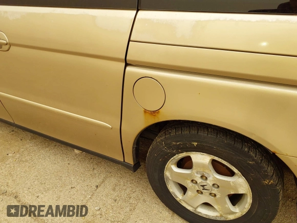 2000 Honda Odyssey EX z VIN 2HKRL1868YH595787, wystawiony jako IAAI lot #41823390 z przebiegiem 243 111 mil mil oraz . Historia ofert i sprzedaży dostępna na DreamBid. Obrazek 6.