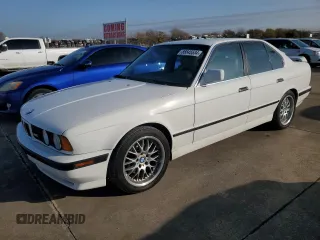 1991 BMW M5 z VIN WBSHD9319MBK05979, wystawiony jako Copart lot #85645534 z przebiegiem 138 219 mil mil oraz Tytuł czysty. Historia ofert i sprzedaży dostępna na DreamBid. Obrazek 1.