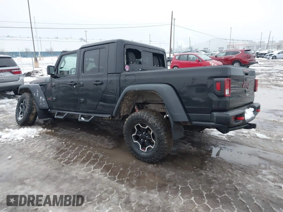 2021 Jeep Gladiator Rubicon z VIN 1C6JJTBG5ML605799, wystawiony jako IAAI lot #41190679 z przebiegiem 47 550 mil mil oraz . Historia ofert i sprzedaży dostępna na DreamBid. Obrazek 3.