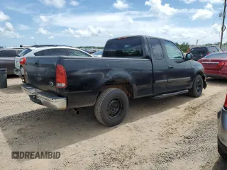 1999 Ford F-150 with VIN 1FTZX1720XKA84187, listed as a Copart auction lot 61401055 with Not provided miles and Salvage title. Bid and sale history available at DreamBid. Image 3.