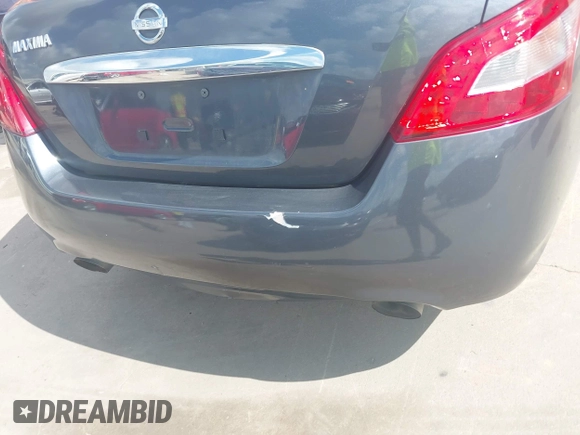 2010 Nissan Maxima SV z VIN 1N4AA5AP5AC820574, wystawiony jako IAAI lot #42427315 z przebiegiem 235 213 mil mil oraz . Historia ofert i sprzedaży dostępna na DreamBid. Obrazek 18.
