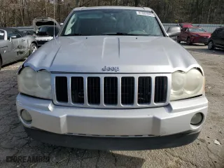 2007 Jeep Grand Cherokee Laredo with VIN 1J8HS48P57C697382, listed as a Copart auction lot 87682865 with 154,732 mi miles and Salvage Title. Bid and sale history available at carsss.com. Image 5.