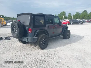 2007 Jeep Wrangler Unlimited Sahara with VIN 1J4GB59167L221686, listed as a IAAI auction lot 42473996 with 151,065 mi miles and . Bid and sale history available at DreamBid. Image 4.
