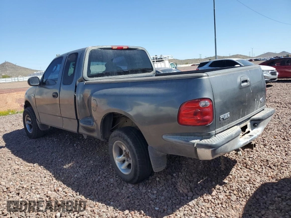 2003 Ford F-150 XL with VIN 1FTRX07WX3KD43808, listed as a Copart auction lot 47951714 with 279,206 mi miles and Salvage title. Bid and sale history available at DreamBid. Image 2.