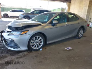 2023 Toyota Camry LE z VIN 4T1C11AK5PU127664, wystawiony jako IAAI lot #41653925 z przebiegiem 24 378 mil mil oraz . Historia ofert i sprzedaży dostępna na DreamBid. Obrazek 19.