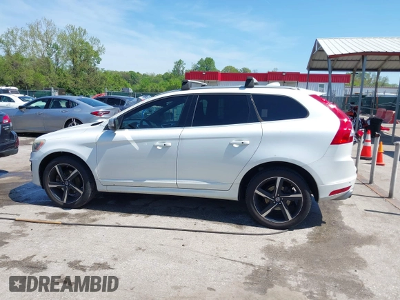 2014 Volvo XC60 R-Design Premier Plus with VIN YV4902DZ0E2546642, listed as a IAAI auction lot 42149824 with 133,669 mi miles and . Bid and sale history available at DreamBid. Image 14.