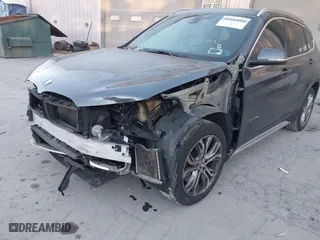 2017 BMW X1 xDrive28i with VIN WBXHT3C33H5F87591, listed as a IAAI auction lot 41256899 with 69,362 mi miles. Bid and sale history available at carsss.com. Image 6.