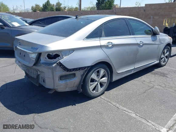 2012 Hyundai Sonata Hybrid with VIN KMHEC4A42CA040077, listed as a IAAI auction lot 42056186 with 167,621 mi miles. Bid and sale history available at carsss.com. Image 4.