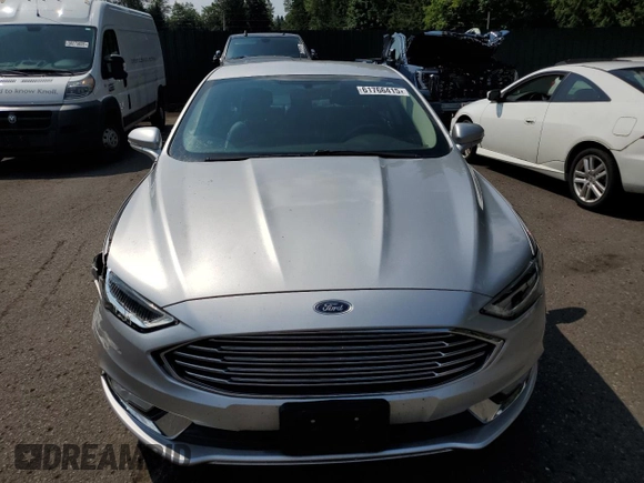 2017 Ford Fusion SE with VIN 3FA6P0HD4HR187841, listed as a Copart auction lot 61766415 with 74,303 mi miles and Salvage title. Bid and sale history available at DreamBid. Image 5.