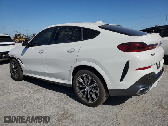2020 BMW X6 xDrive40i z VIN 5UXCY6C00L9D45082, wystawiony jako Copart lot #52588665 z przebiegiem 40 810 mil mil oraz Szkoda całkowita • Salvage title. Historia ofert i sprzedaży dostępna na DreamBid. Obrazek 2.