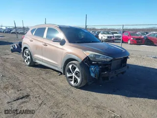 2016 Hyundai Tucson Sport with VIN KM8J33A20GU183234, listed as a IAAI auction lot 41429777 with 113,077 mi miles. Bid and sale history available at carsss.com. Image 1.