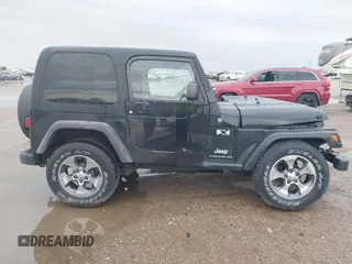 2004 Jeep Wrangler X with VIN 1J4FA39S34P753865, listed as a IAAI auction lot 41948545 with 198,169 mi miles. Bid and sale history available at carsss.com. Image 13.