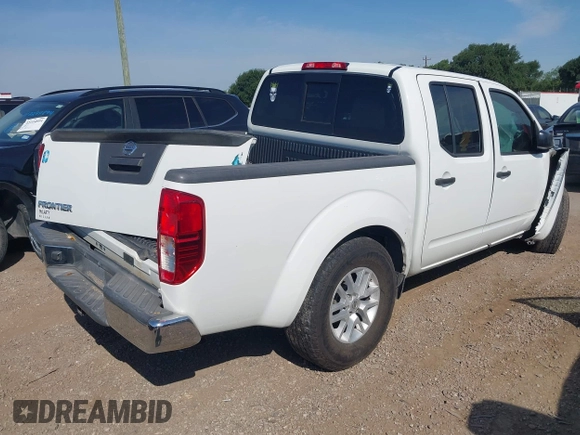 2015 Nissan Frontier S with VIN 1N6AD0EV3FN740597, listed as a IAAI auction lot 42257170 with 171,582 mi miles and . Bid and sale history available at DreamBid. Image 4.