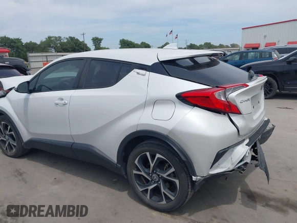 2022 Toyota C-HR XLE z VIN NMTKHMBX2NR144638, wystawiony jako IAAI lot #42063325 z przebiegiem 22 823 mil mil oraz . Historia ofert i sprzedaży dostępna na DreamBid. Obrazek 14.