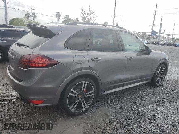 2014 Porsche Cayenne GTS с VIN WP1AD2A22ELA70950, выставлен на аукционе Copart как лот 48324015 с пробегом 75 310 миль миль и На запчасти • Non repairable. История ставок и продаж доступна на DreamBid. Изображение 3.
