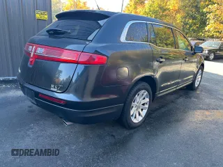 2015 Lincoln MKT with VIN 2LMHJ5NK0FBL03293, listed as a Copart auction lot 47944345 with 225,994 mi miles and Clean Title. Bid and sale history available at DreamBid. Image 4.