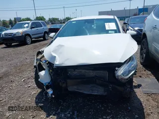 2019 Kia Forte LXS z VIN 3KPF24AD2KE098665, wystawiony jako IAAI lot #42623214 z przebiegiem 124 857 mil mil oraz . Historia ofert i sprzedaży dostępna na DreamBid. Obrazek 12.