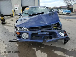 2000 Subaru Impreza RS with VIN JF1GM6750YG400589, listed as a Copart auction lot 78799154 with Not provided miles and Salvage title. Bid and sale history available at DreamBid. Image 5.