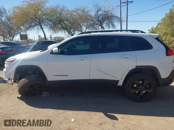 2016 Jeep Cherokee Latitude with VIN 1C4PJMCS9GW134769, listed as a IAAI auction lot 41668793 with 122,539 mi miles and . Bid and sale history available at carsss.com. Image 14.