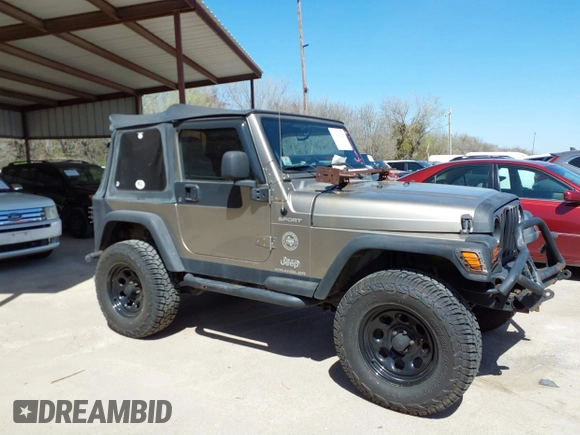 2005 Jeep Wrangler Sport with VIN 1J4FA49S45P345673, listed as a IAAI auction lot 41830128 with 139,432 mi miles. Bid and sale history available at carsss.com. Image 13.